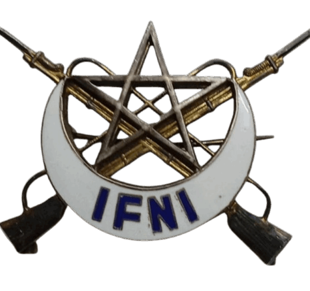 DISTINTIVO DE PERMANENCIA EN EL CUERPO TIRADORES DE IFNI DORADA Y ESMALTADA.